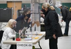 Poll workers are short-staffed, under attack — and quietly defending democracy