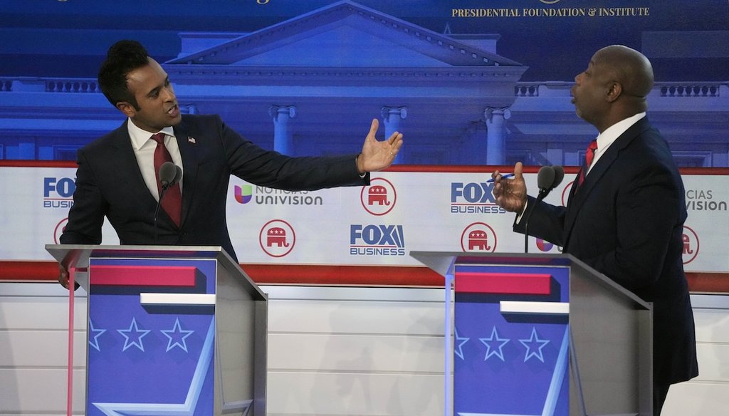 Businessman Vivek Ramaswamy, left, argues a point with Sen. Tim Scott, R-S.C.,during a Republican presidential primary debate hosted by FOX Business Network and Univision, Sept. 27, 2023, at the Ronald Reagan Presidential Library in California. (AP)