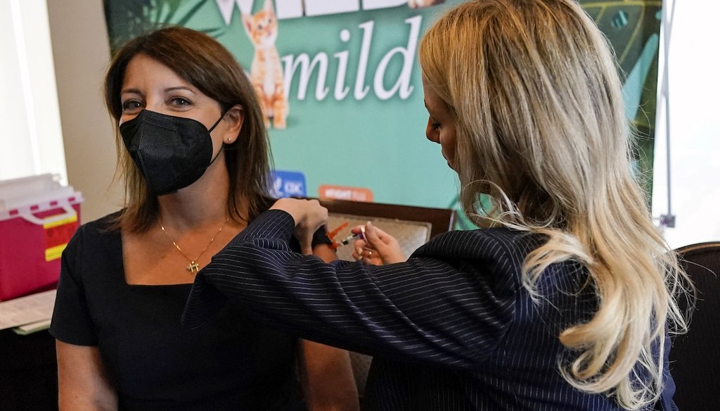 Dr. Mandy Cohen, director of the Centers for Disease Control and Prevention, receives a flu vaccine at the Atlanta Press Club on Sept. 6, 2023. (AP)