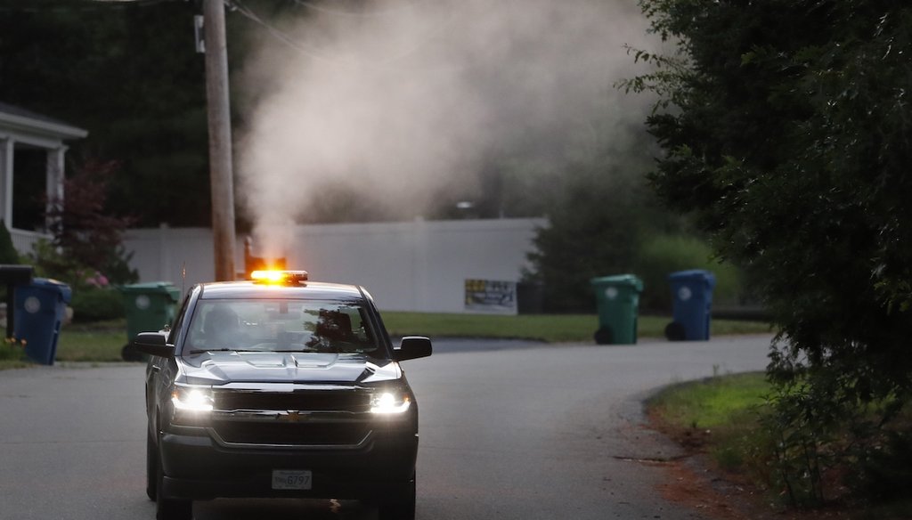 A crew in Burlington, Mass, sprays pesticides to control mosquitos from a pick-up truck on July 8, 2020. It's a tactic commonly used in cities across the U.S., including New York City, to combat mosquito-borne illnesses. (AP)